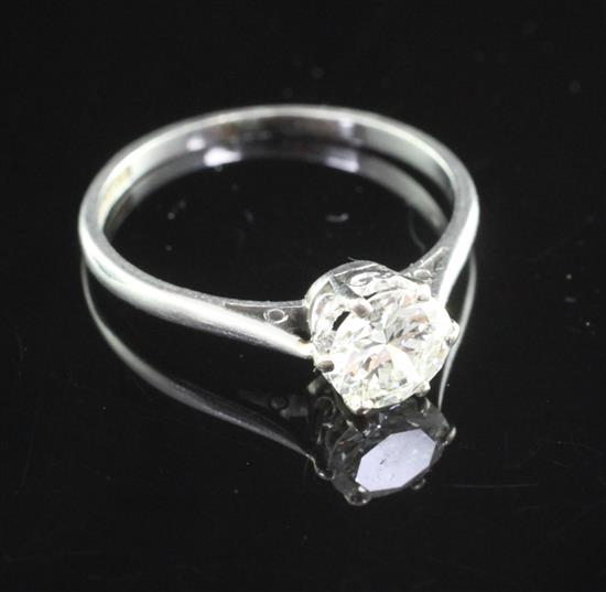 A platinum and solitaire diamond ring, size M.